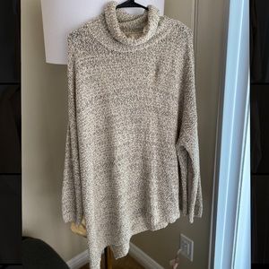 Cowl neck long split asymmetrical hem sweater.